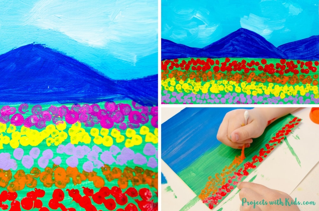 technika finger painting dziecko maluje palcami w kolorowych farbach na papierze